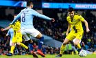 Scott Fraser takes on Ilkay Gundogan of Manchester City in the League Cup semi-final.