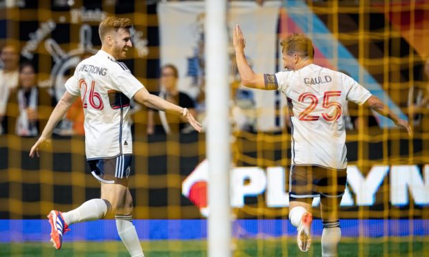 Stuart Armstrong, left, and Ryan Gauld celebrate the former's strike