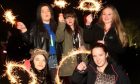 A group of girls with sparklers at the bonfire night event in Baxter Park in Dundee in 2013.