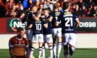 Dundee celebrate at Motherwell.