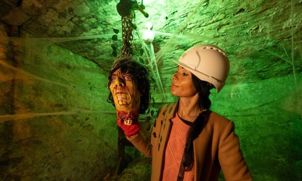 Gayle meets a severed head during a tour of Dundee's underground vaults. Image: Paul Reid.