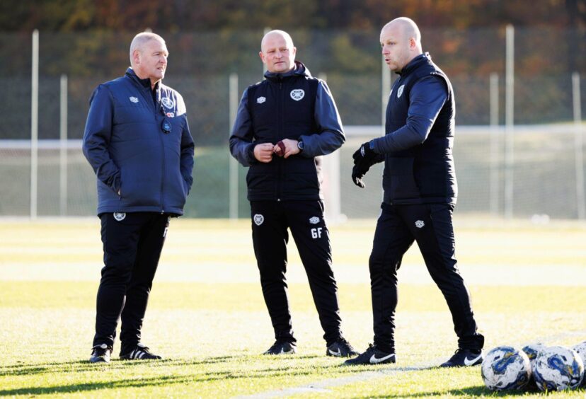 Gordon Forrest, centre, was recently dismissed from his position as part of the Hearts management staff