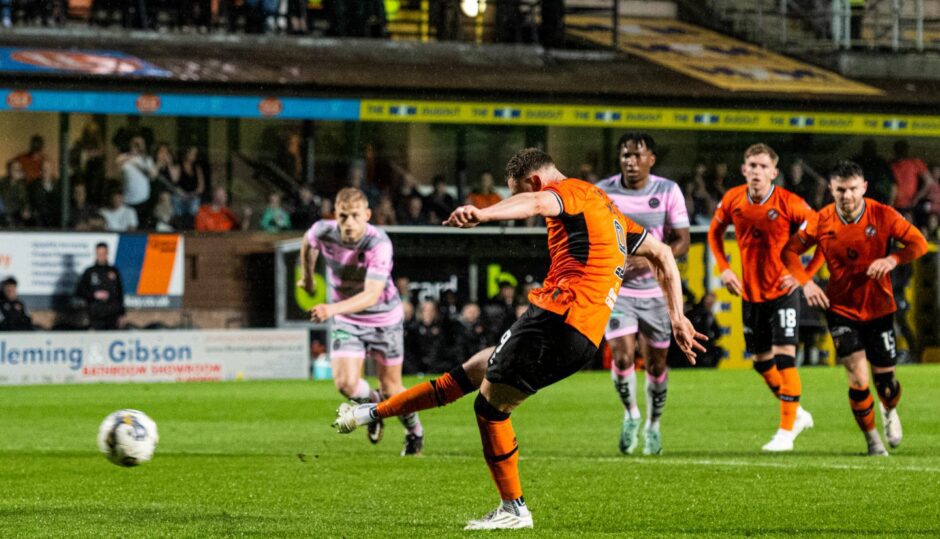 Louis Moult takes a penalty awarded by Steven McLean