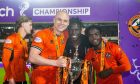 Sadat Anaku, centre, celebrates United's Championship win