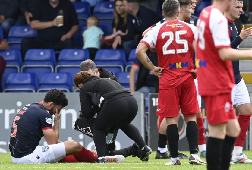 Ricki Lamie got injured in his third Ross County appearance. Image: Rob Casey/SNS