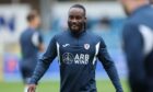 Fankaty Dabo warming up at Raith Rovers' clash with Greenock Morton. Image: Roddy Scott/SNS