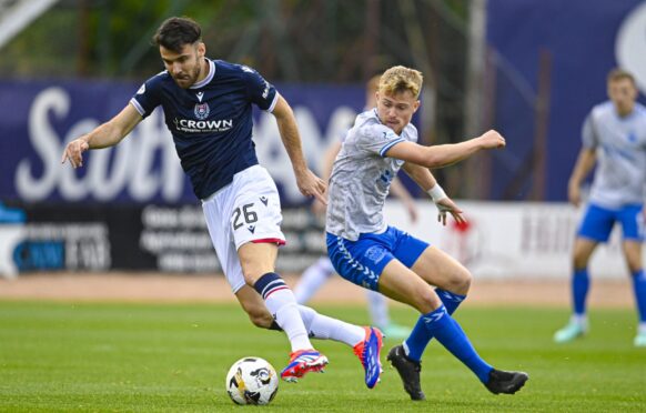 Scott Fraser in action for Dundee. Image: Rob Casey/SNS