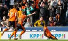 Emmanuel Adegboyega celebrates in front of the delirious Arabs.