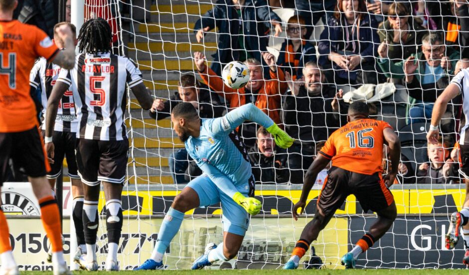 Dundee United's Emmanuel Adegboyega makes no mistake