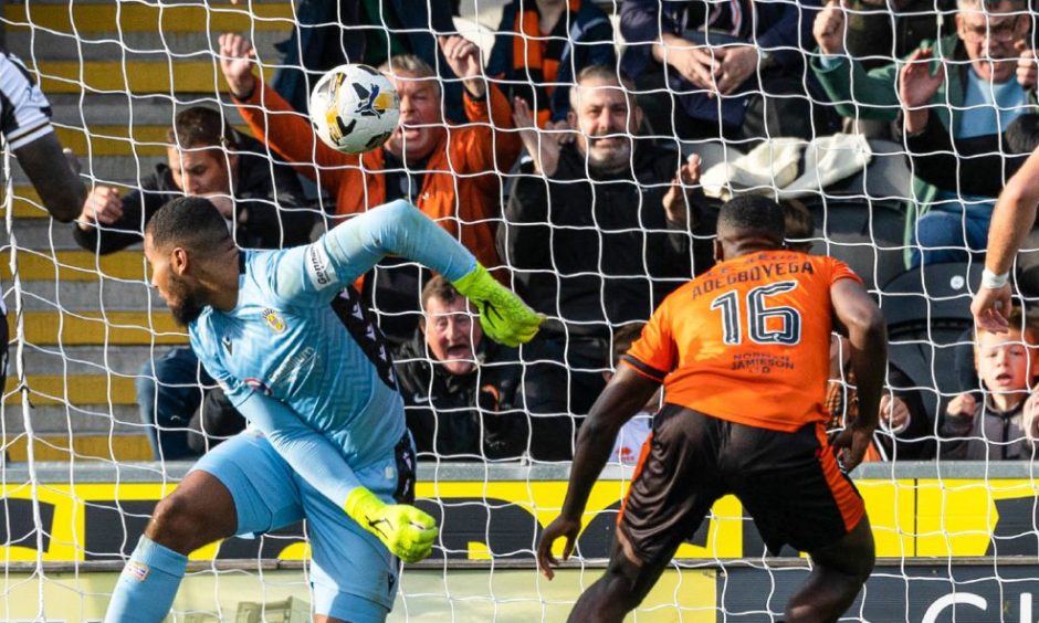 Dundee United's Emmanuel Adegboyega makes no mistake