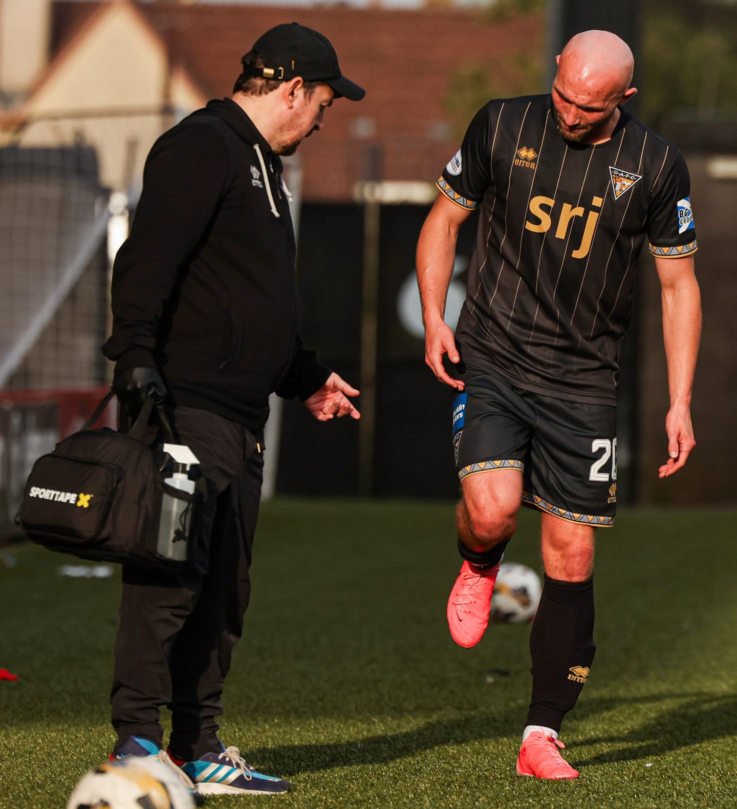 Pars striker Chris Kane is taken off with a knee injury against Airdrie.