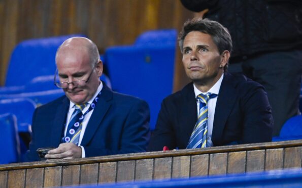 Simo Valakari in the main stand at Ibrox with Gus MacPherson.