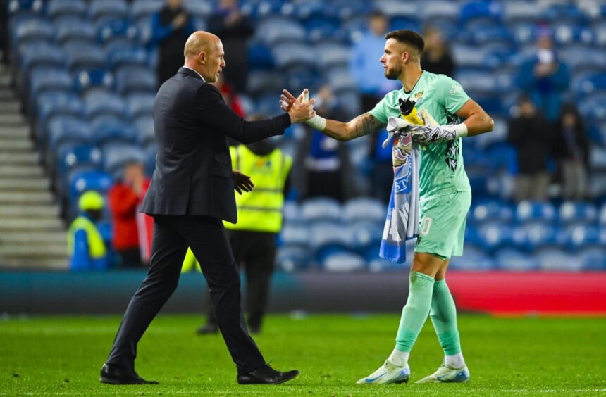 Rangers manager Philippe Clement shakes hands with St Johnstone's Ross Sinclair at full-time. 