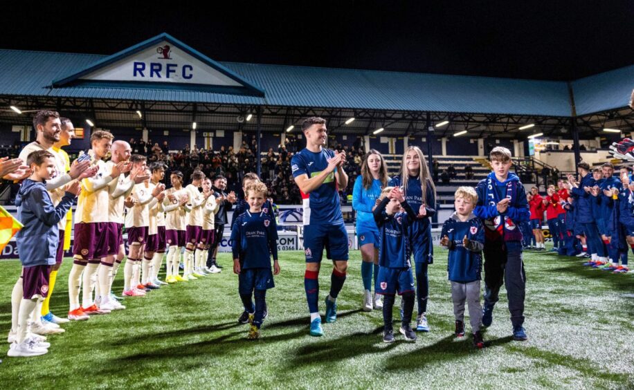 Ross Matthews receives a guard of honour ahead of his testimonial against Hearts.