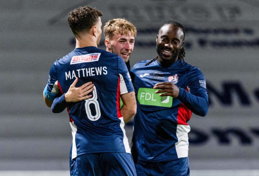 Lewis Jamieson celebrates with Ross Matthews and Fankaty Dabo after scoring Raith Rovers' equaliser.