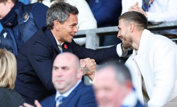 Barry Douglas meets Simo Valakari before St Johnstone played Ross County.