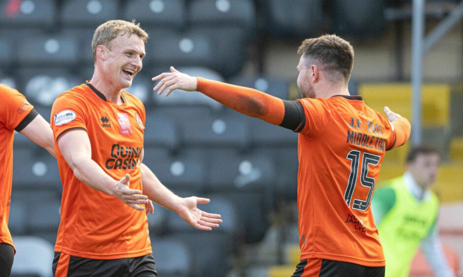 Sam Dalby, left, toasts Glenn Middleton following his super assist.