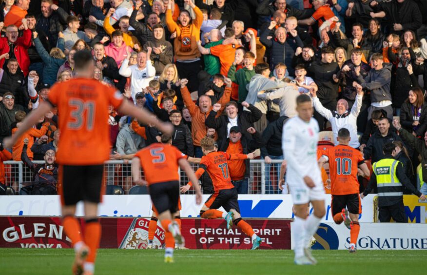 Luca Stephenson, No.17, celebrates his second Dundee United goal of the season against Hibs