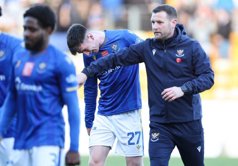 Andy Kirk with son, Makenzie, at full-time. 