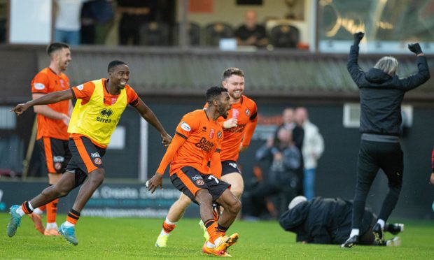 Nicky Clark celebrates his goal.