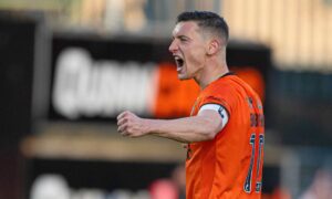 David Babunski, captain for the day, roars with delight
