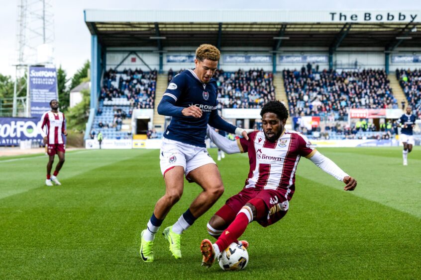 Ethan Ingram takes on St Johnstone. Image: Craig Foy/SNS