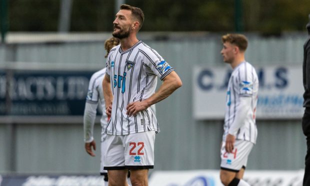 Craig Clay looks dejected at full-time after Dunfermline's defeat against Falkirk.