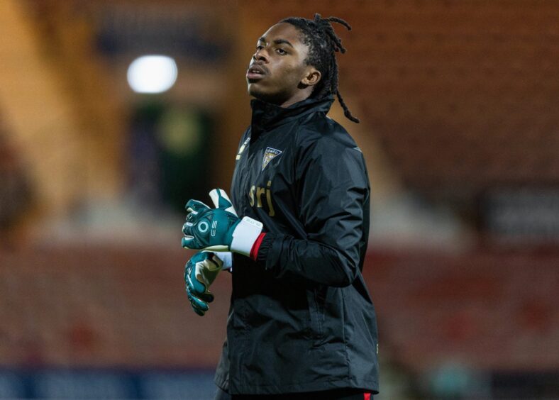 Tobi Oluwayemi warms up before Dunfermline's victory over Livingston.