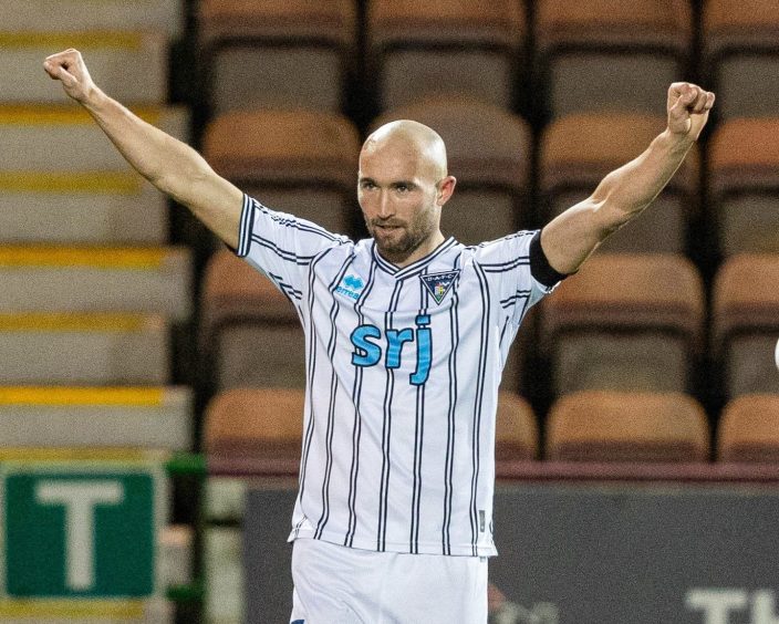 Chris Kane celebrates his first goal in the win against Livingston.