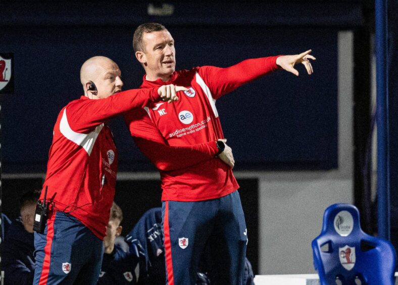 Neill Collins points to something on the pitch during the win over Airdrie.