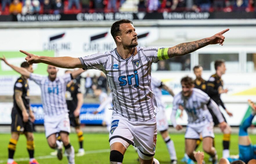 Kyle Benedictus celebrates scoring Dunfermline's second goal in their 3-0 win over Livingston.