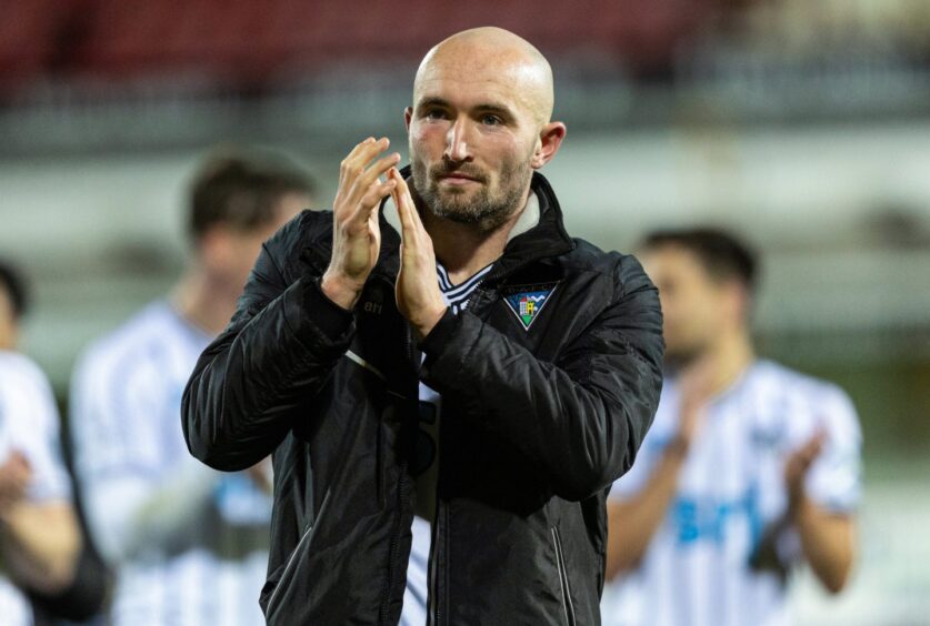 Chris Kane claps the Dunfermline fans at the end of the win over Livingston.