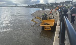 Digger stuck in water at Broughty Ferry beach