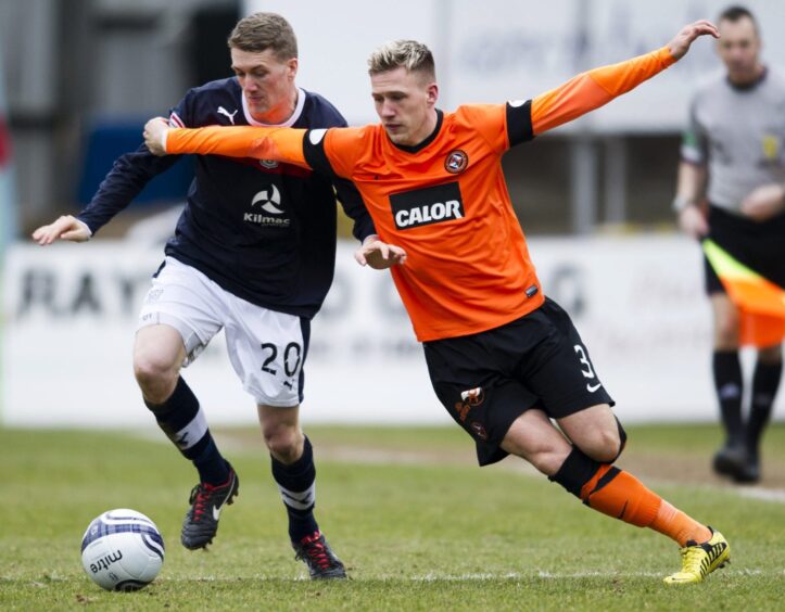 Barry Douglas takes on Jim McAlister in a Dundee derby back in 2013. Image: SNS