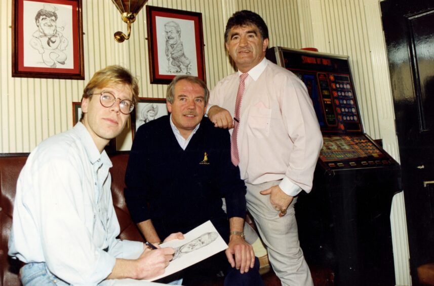 Dundee artist Chris Taylor sketching Ed McHugh and Rab Adam in 1990. 