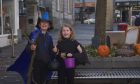 Adair and Erraid Ramsay, aged 12 and 10, were enjoying the Halloween activities. Image: Ciara Tait