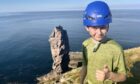 Aden Thurlow on the cliffside by Old Man of Stoer