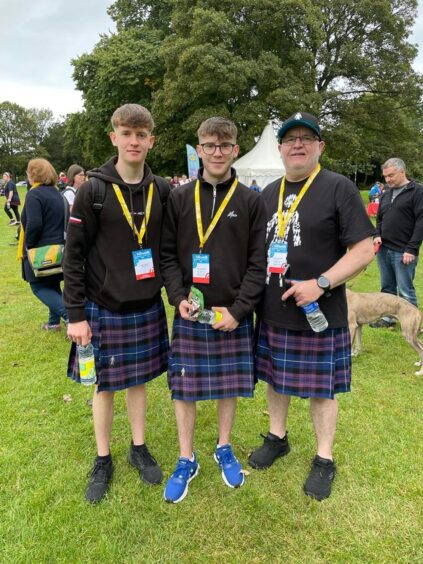 Andrew with his sons Dean (far left) and Connor who completed the Edinburgh Kiltwalk last year to raise funds for Prostate Cancer.