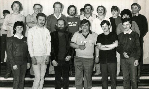 Jocky Wilson during an exhibition at the Angus Hotel in 1984. Image: DC Thomson.