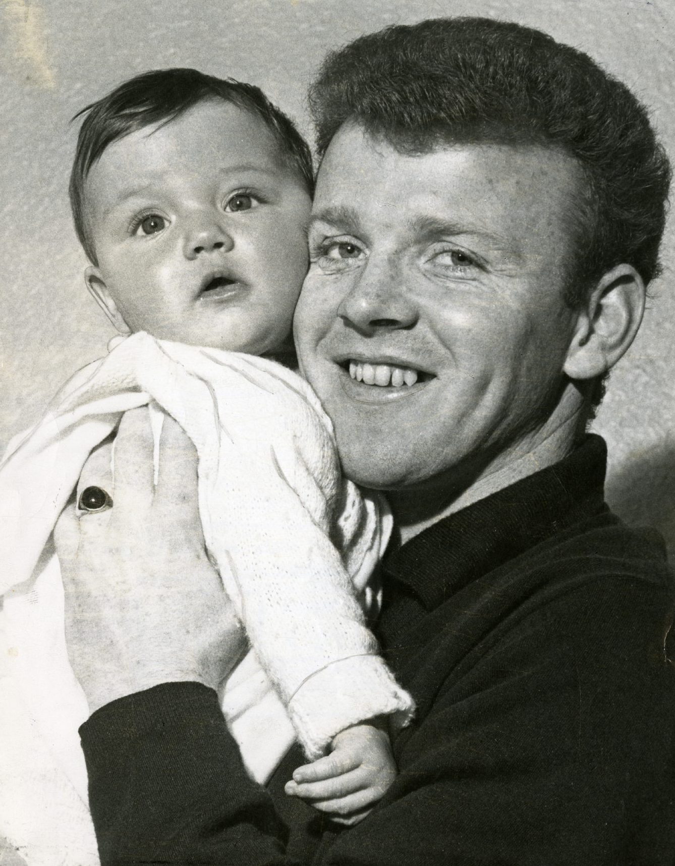 Bremner holds his daughter Donna in 1967.