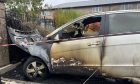 The burnt-out car off Annfield Road.