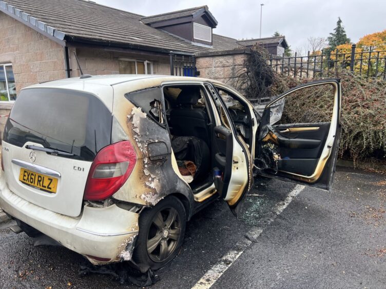 The burnt-out car on Annfield Road in Dundee