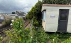 The static caravan is beside the main east coast rail line at Carnoustie. Image: Supplied