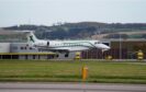 The plane carrying the body of former first minister of Scotland Alex Salmond lands at Aberdeen Airport. Image: PA