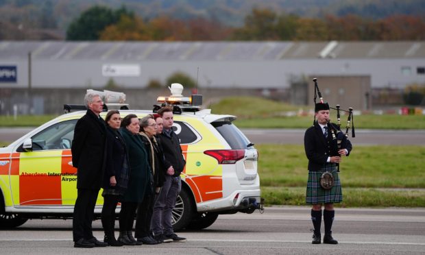 Connor Sinclair (far right) with members of Alex Salmond's family and acting Alba leader Kenny MacAskill (left). Image: PA