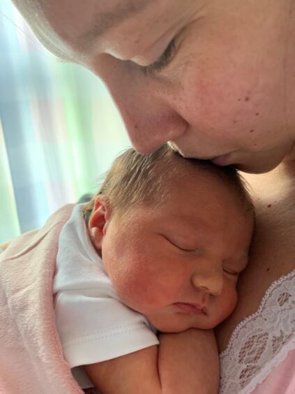 Fife mum Erin pictured with her daughter Sophia after recovering from breast cancer