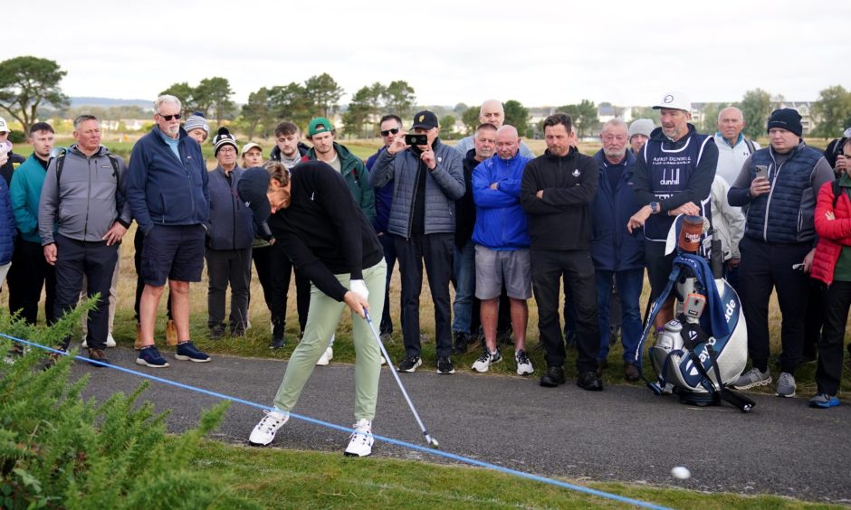 Tommy Fleetwood lines up a shot on the 14th at Carnoustie