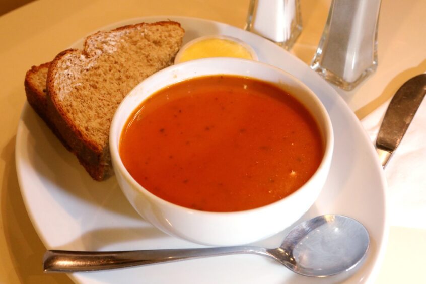 A bowl of tomato soup and a sandwich at Fisher and Donaldson, Dundee.