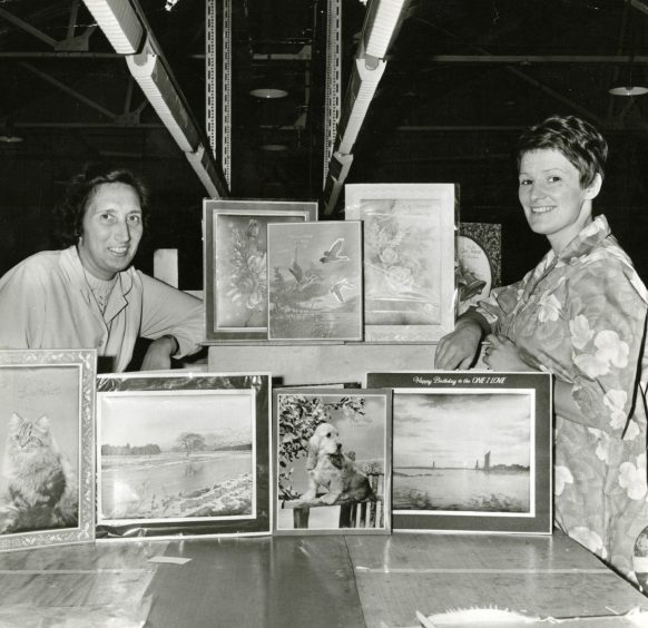 Sandra Zane and Jean Hammond with a display of prints in 1968.