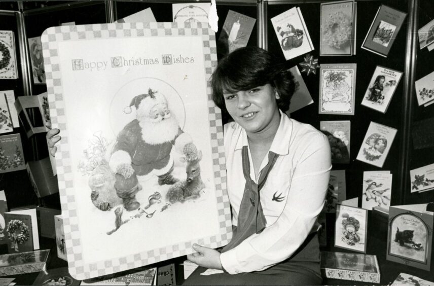 Fiona Colbron with the largest of the Valentines greetings card collection, a Christmas card, in 1984. 